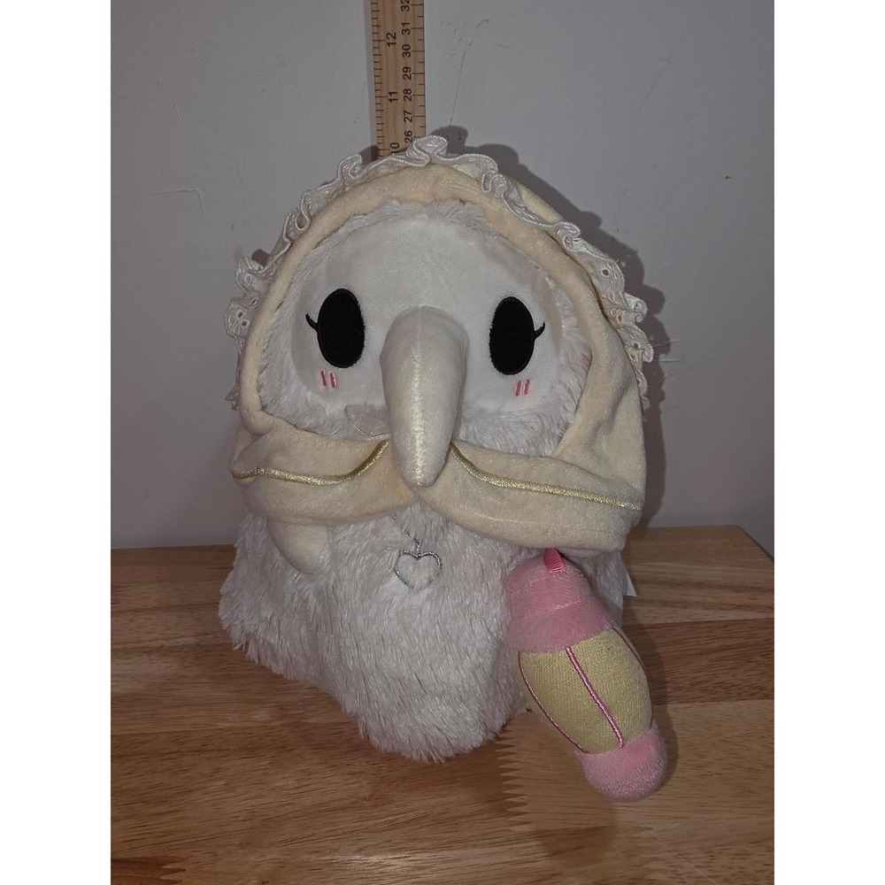 Mini Plague Nurse Squishable plush toy, featuring a white bird-like beak